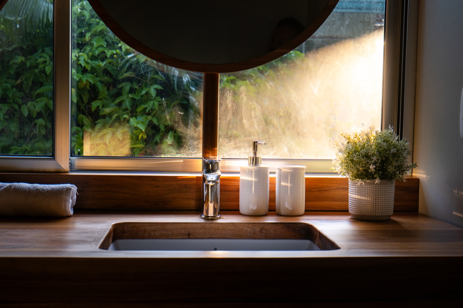 Bathroom vanity with golden sunset light
