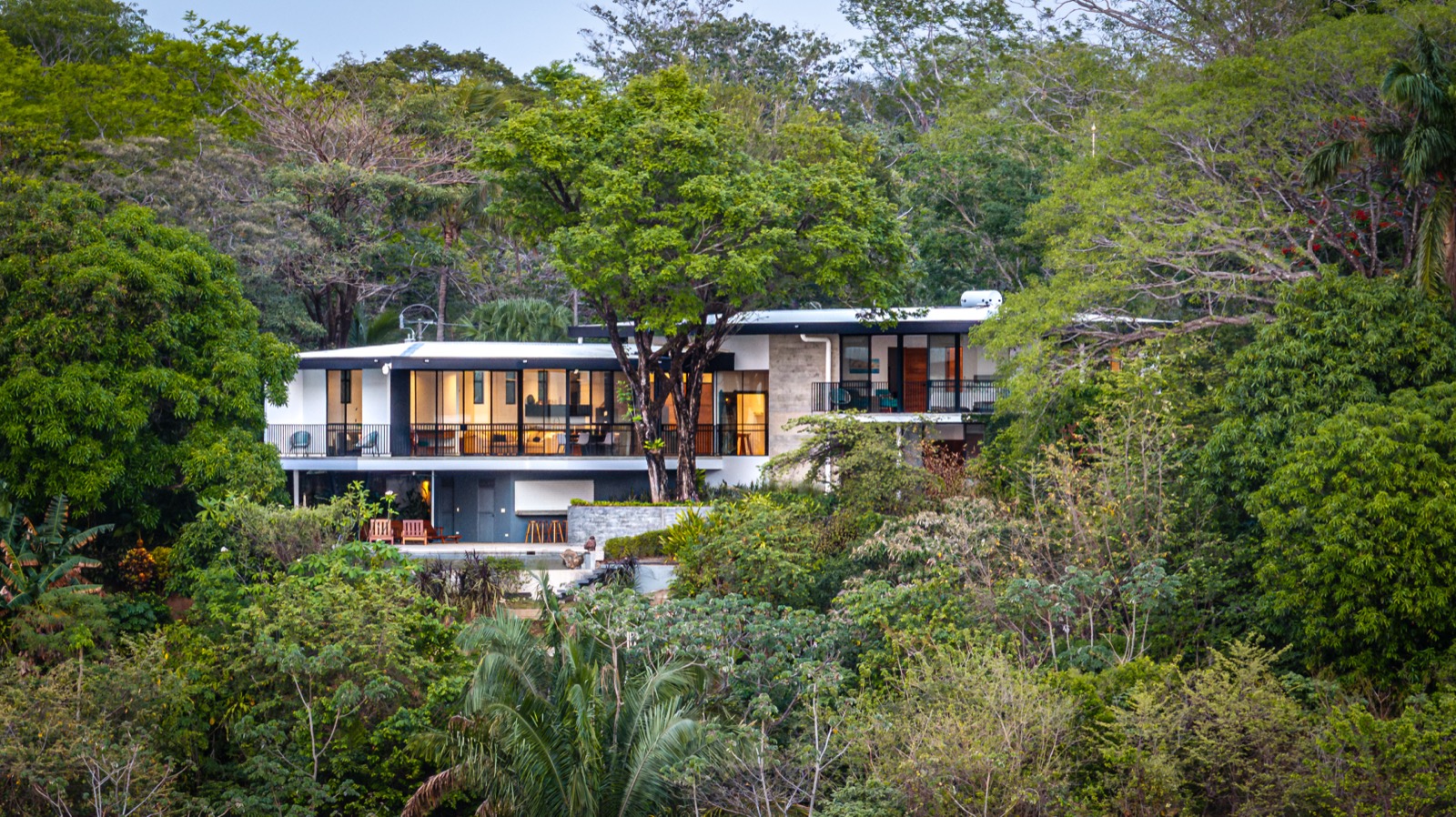 Luxurious wooden bedroom suite with freestanding bathtub
