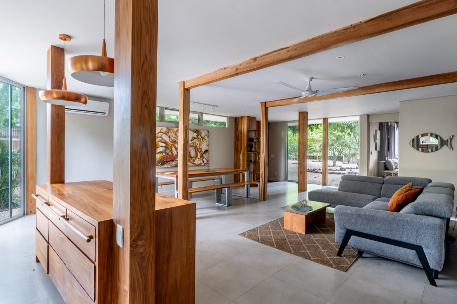 Contemporary living room with wood beams and modern furniture
