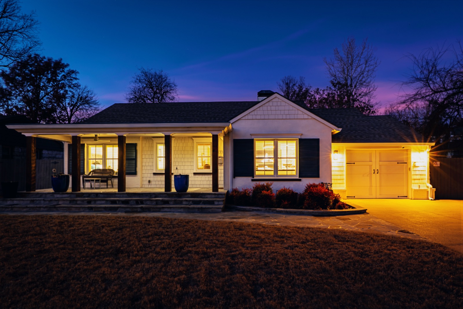 Classic home exterior illuminated at twilight