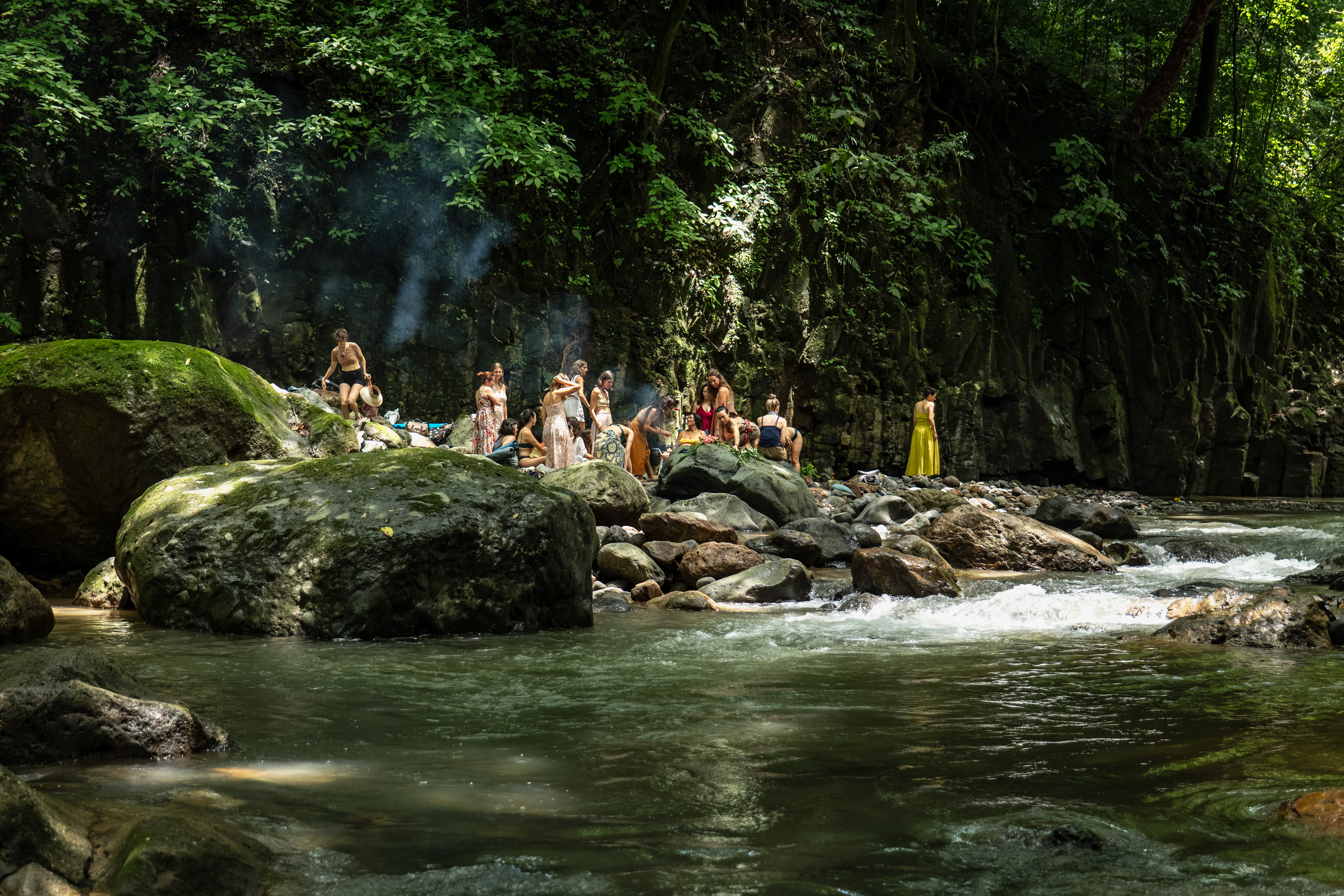 Retreat group by the river in the jungle